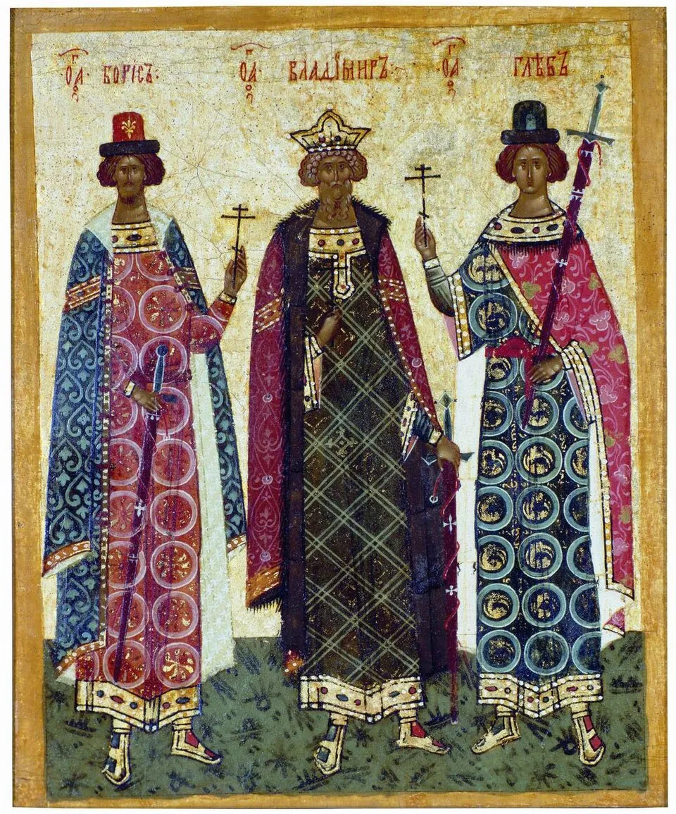 Russian icon of XV-XVI c. with St. Vladimir, Boris and Gleb. Икона новгородской школы, 33.5 х 29 мм, с изображением св. Владимира, Бориса и Глеба. Находится в дом-музее П. Д. Корина (филиал ГТГ), Москва, Россия. Воспроизводится по изданию: Лазарев В.Н. «Страницы истории новгородской живописи. Двусторонние таблетки из собора Св. Софии в Новгороде». М., Искусство, 1983
Икона двусторонняя, на лицевой стороне - Преображение.