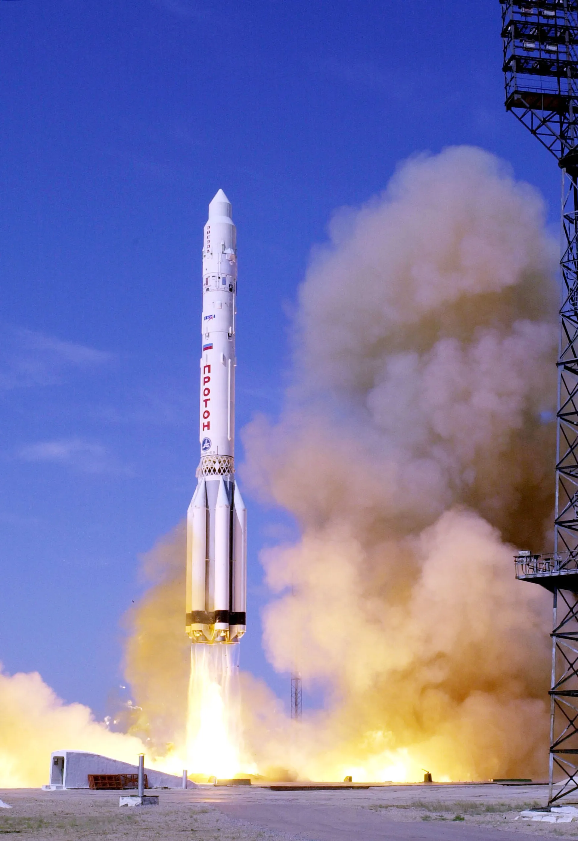 The Russian Proton rocket is the tallest rocket in routine use. First deployed in 1965, the rocket stands typically 40 meters tall, can carry unusually heavy payloads into space, and maintains a high record of reliability, being configured to launch satellites into orbit, to carry modules to space stations, and to carry people. Previous Proton payloads include include Iridium, GRANAT, Mir modules and others. The Proton frequently launched modules that docked with the Mir Space Station. Pictured above on 12 July 2000, a Proton-K rocket launches the Zvezda service module which became the third major component to be added to the International Space Station. The Proton is launched from the Baikonur Cosmodrome in Kazakstan.