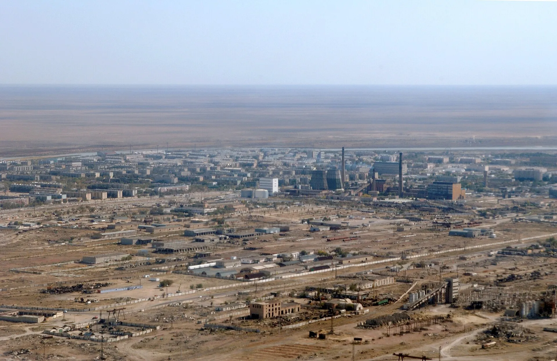 The city of Baikonur, Kazakhstan, is seen from the aircraft carrying astronaut Leroy Chiao, Expedition 10 commander and NASA International Space Station (ISS) science officer, cosmonaut Salizhan Sharipov, Russia’s Federal Space Agency flight engineer and Soyuz commander, and Russian Space Forces cosmonaut Yuri Shargin. The crew will prepare for their launch on the Soyuz TMA-5 spacecraft October 14, 2004, to the ISS.