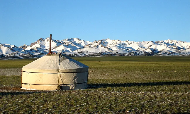 Yurt with the Gurvansaikhan Mountains behind, part of Gobi Gurvansaikhan National Park