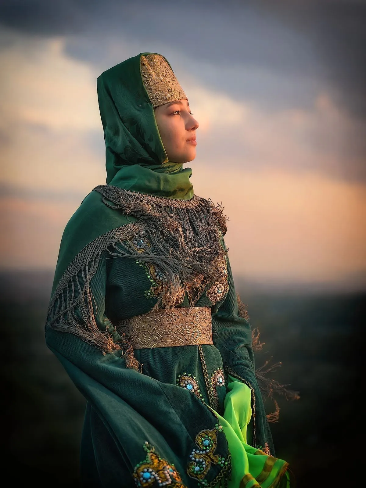 Young Noghay girl in traditional dress. Erkin-Khalk village, Northern Caucasus