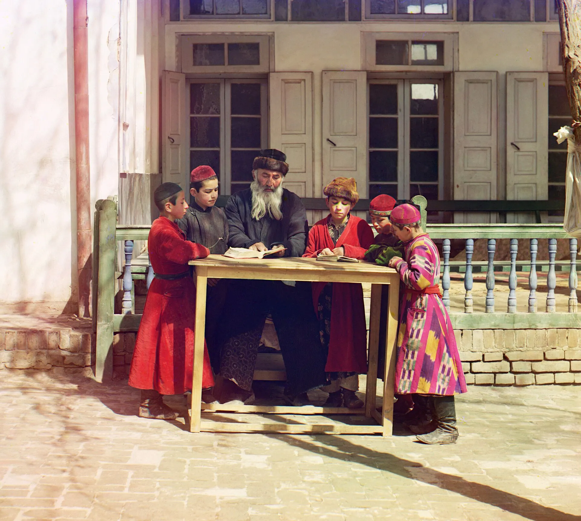 Jewish Children with their Teacher in Samarkand. Early color photograph from Russia, created by Sergei Mikhailovich Prokudin-Gorskii as part of his work to document the Russian Empire from 1909 to 1915.
