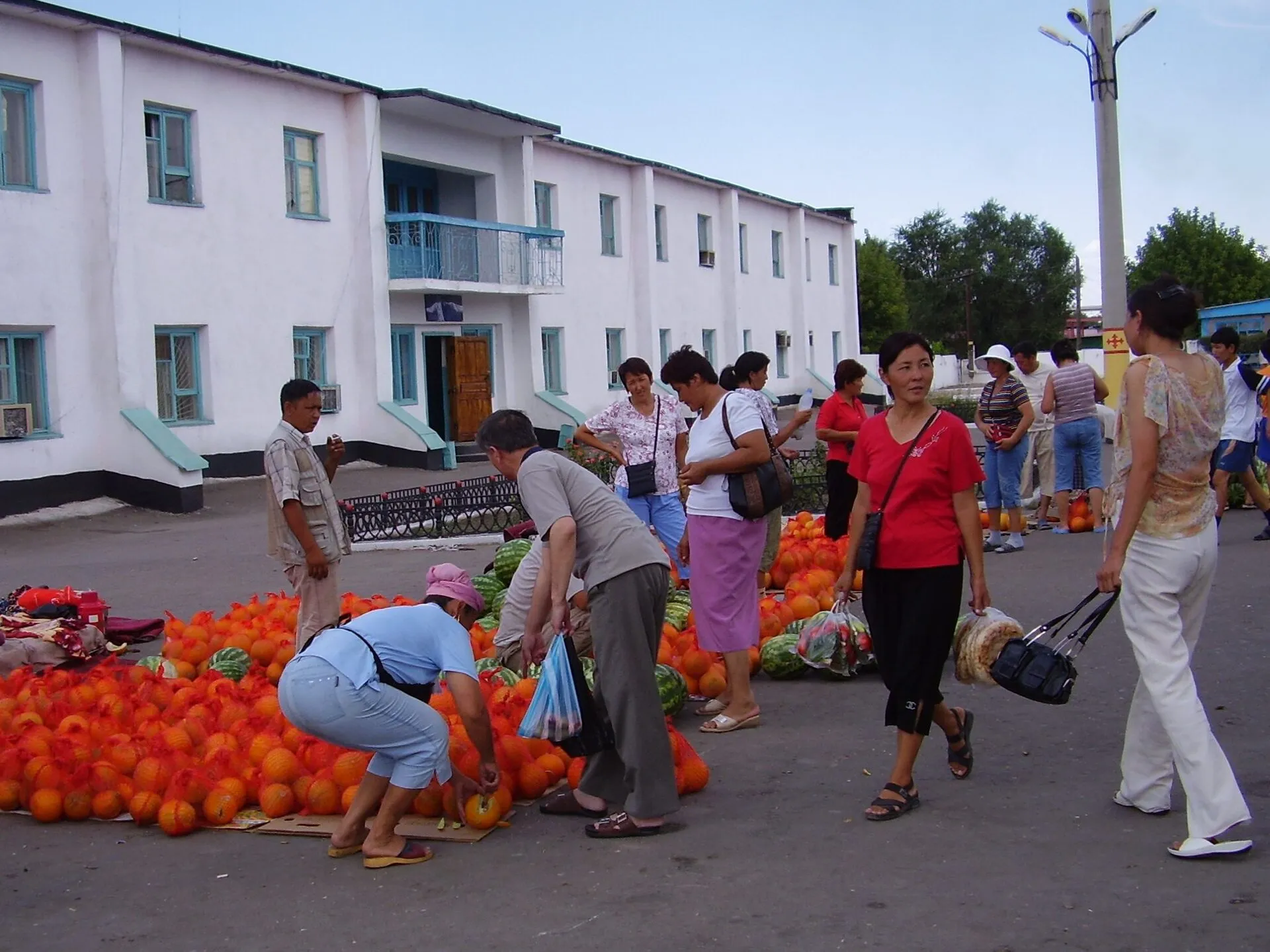 Sale of melons on platform railway station of the city of Shu, Zhambyl Province of Kazakhstan.