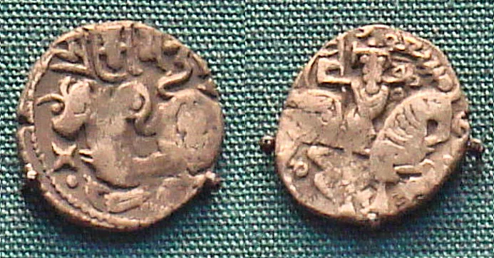 Massud I of Ghazni coin, derived from Shahi design, with the name of Massud in Arabic script