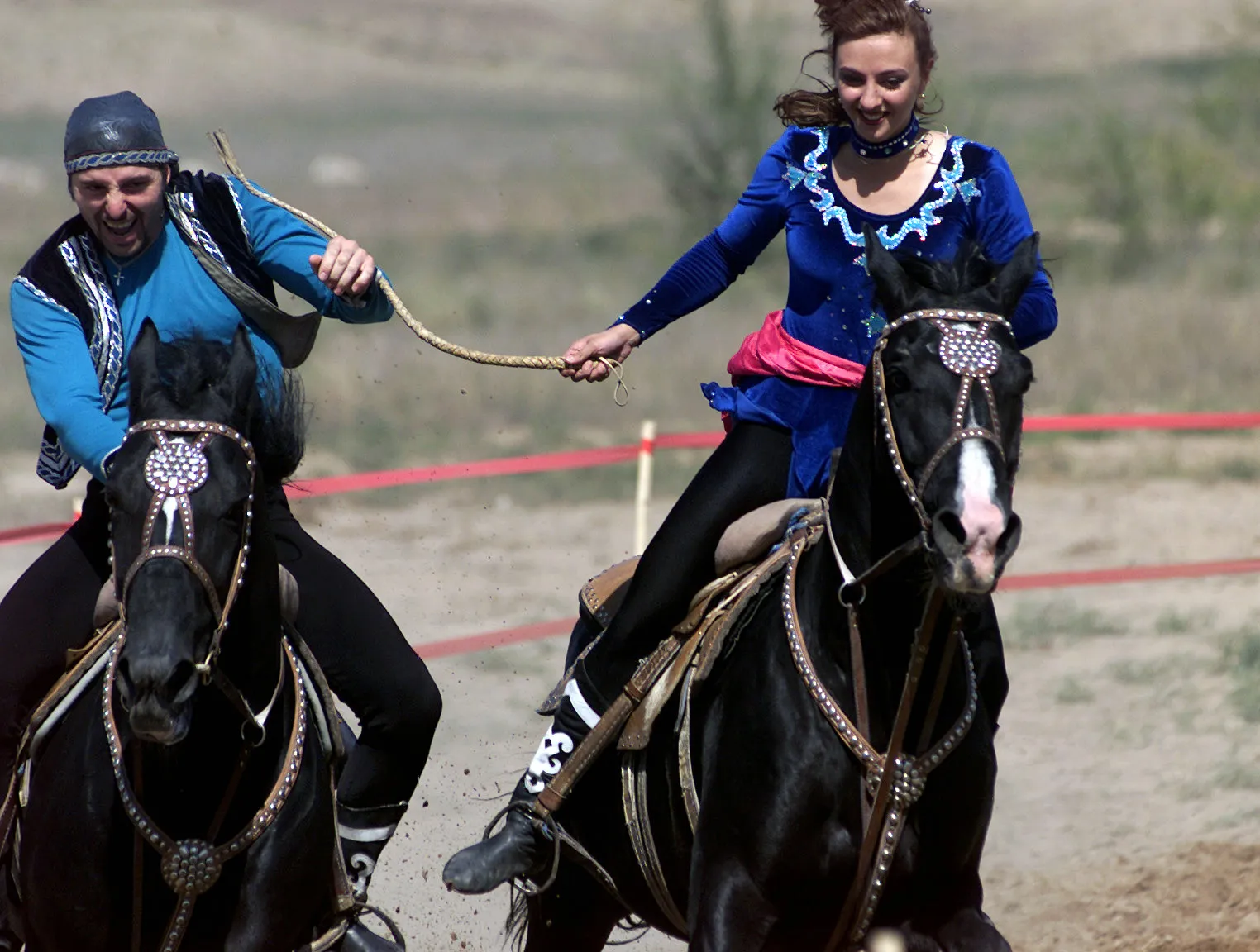 Traditional Kazakh horseback game of "Catch the Girl" (Kuuz Kuu)